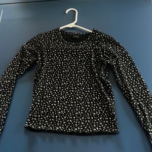 Black with flowers along sleeve